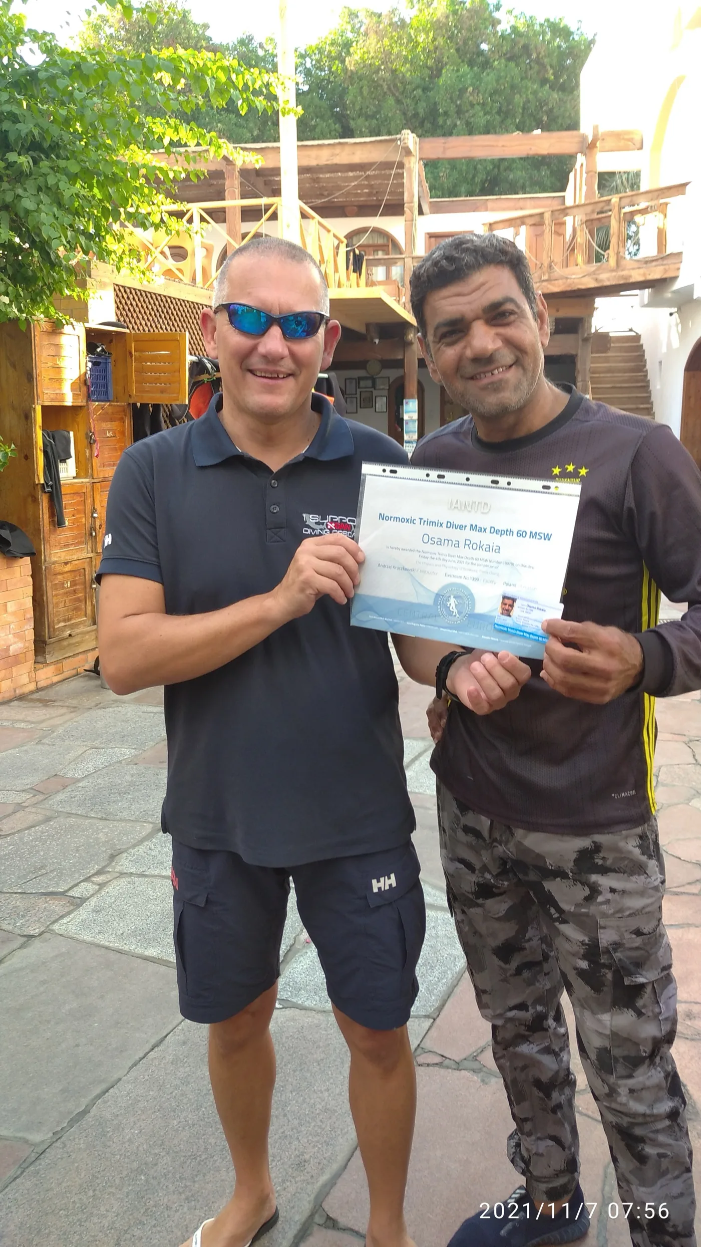 Osama in 2021 with his instructor, marking the handover from student to teacher